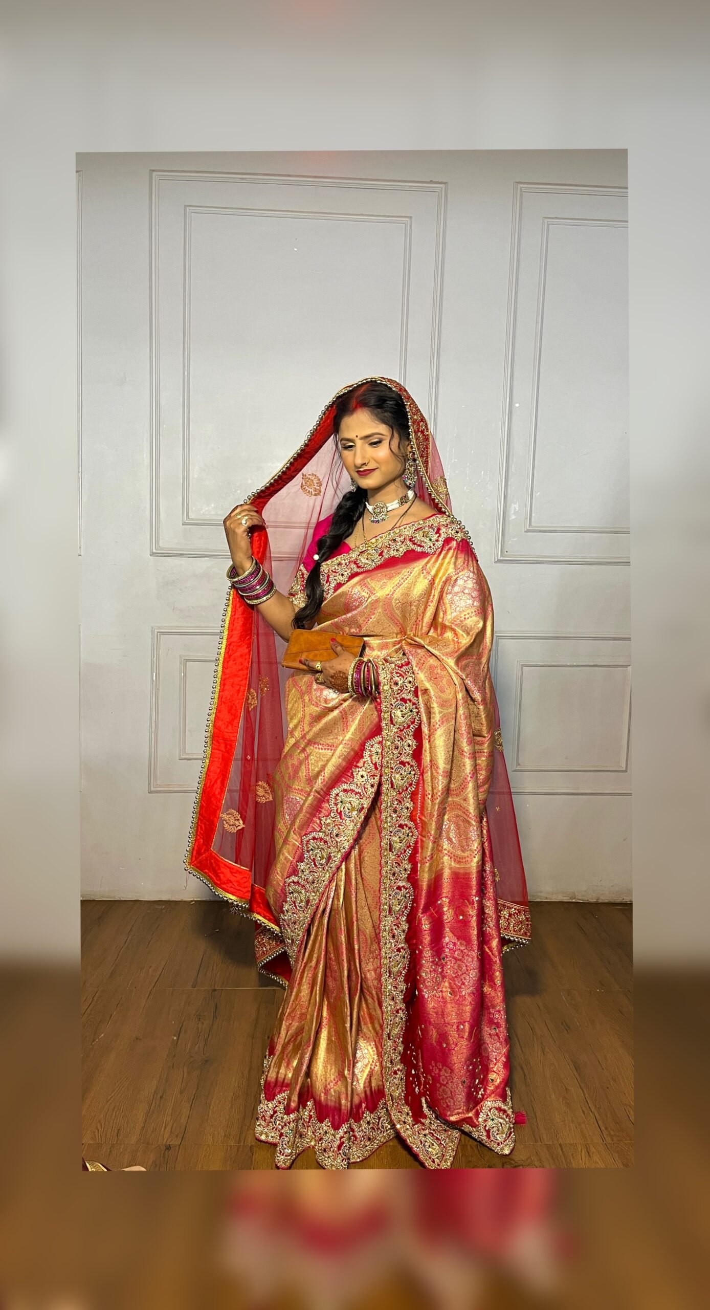 Bridal red and gold traditional saree look